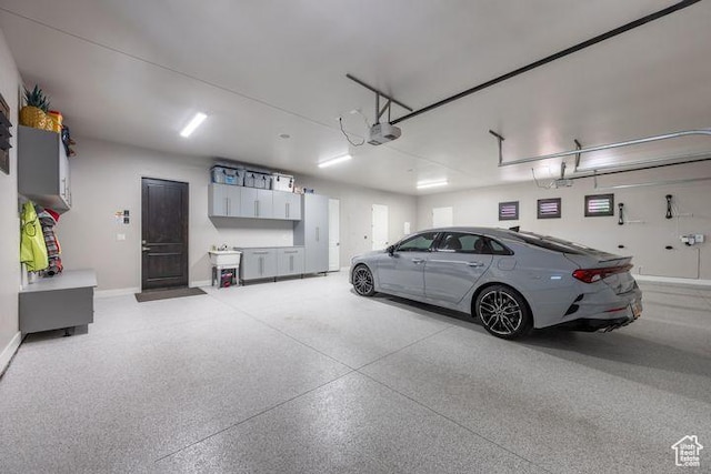 3052 N Snow Canyon Pkwy Unit 201, St George, UT 84770 - garage with baseboards and a garage door opener