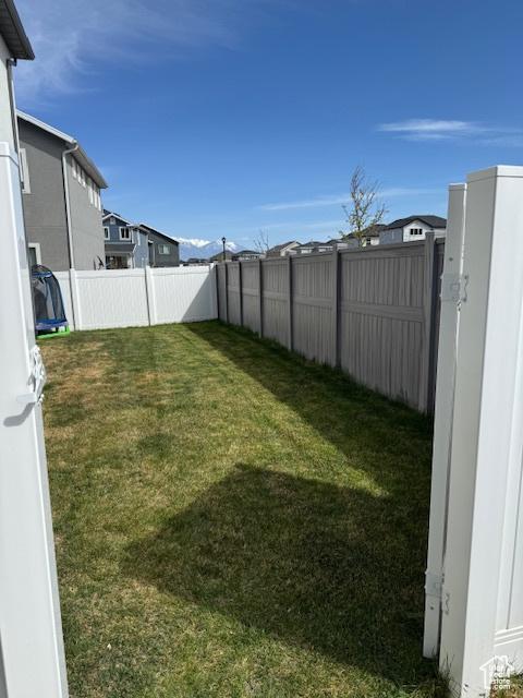 4834 E Hidden Steppe Bnd, Eagle Mountain, UT 84005 - view of yard with a fenced backyard
