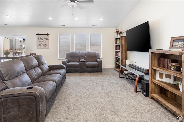living room featuring vaulted ceiling, recessed lighting, visible vents, ceiling fan, and carpet