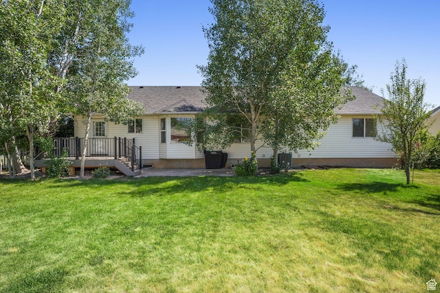 1320 W 1340 N, Pleasant Grove, UT 84062 - back of property featuring a deck, a lawn, and roof with shingles