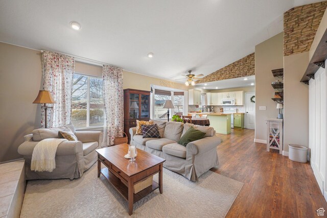 1320 W 1340 N, Pleasant Grove, UT 84062 - living area featuring ceiling fan, high vaulted ceiling, plenty of natural light, and wood finished floors