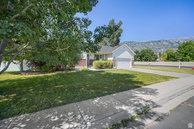 1320 W 1340 N, Pleasant Grove, UT 84062 - view of front of home featuring a garage, driveway, brick siding, and a mountain view