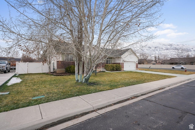 1320 W 1340 N, Pleasant Grove, UT 84062 - view of front facade featuring an attached garage, fence, driveway, a residential view, and a front yard
