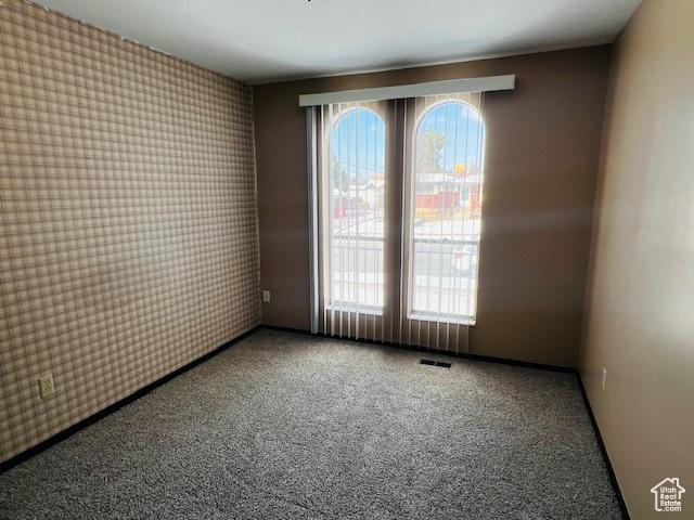 2299 W 5950 S, Roy, UT 84067 - carpeted empty room with wallpapered walls