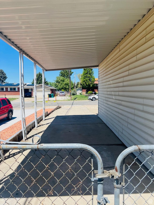2299 W 5950 S, Roy, UT 84067 - view of patio featuring an attached carport