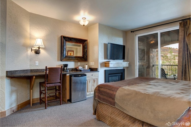 2653 W Canyons Resort Dr Unit 226, Park City, UT 84098 - bedroom with carpet floors, refrigerator, access to outside, and a textured wall
