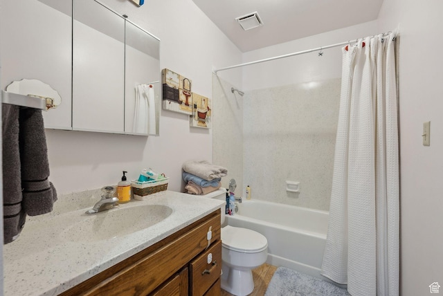 bathroom with shower / bath combo with shower curtain, visible vents, toilet, and vanity
