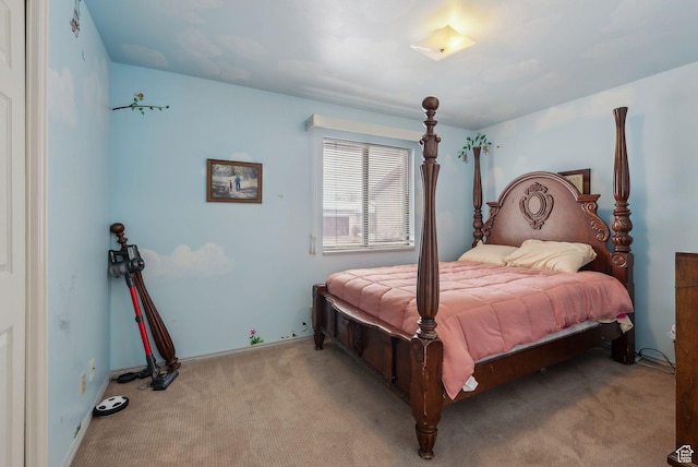 bedroom featuring carpet flooring and baseboards