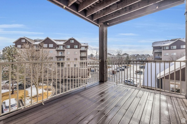 4988 S Timber Way E Unit 310, Salt Lake City, UT 84117 - wooden deck with a residential view