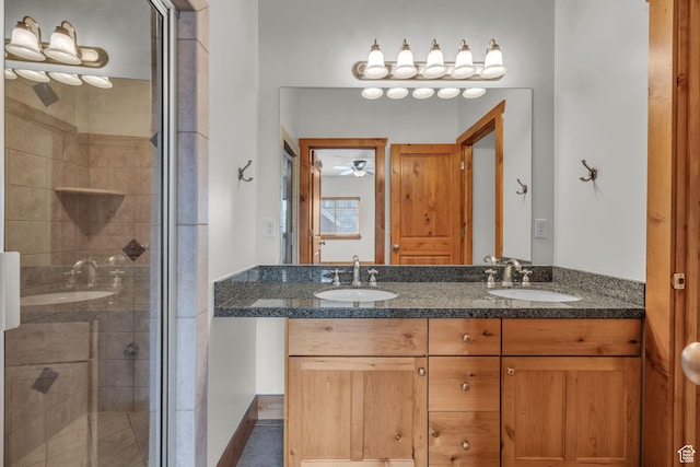 4988 S Timber Way E Unit 310, Salt Lake City, UT 84117 - full bath with double vanity, a stall shower, and a sink