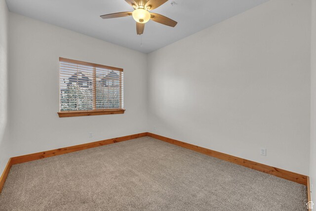 4988 S Timber Way E Unit 310, Salt Lake City, UT 84117 - empty room featuring ceiling fan, baseboards, and carpet flooring