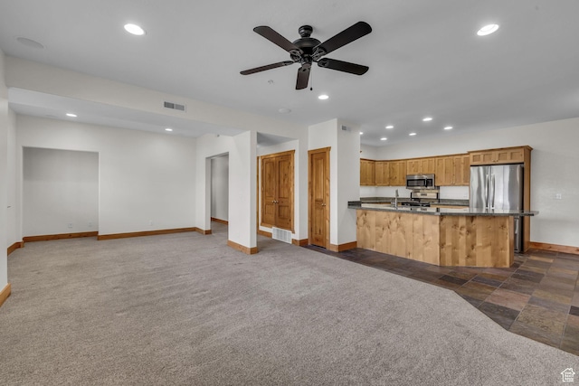 4988 S Timber Way E Unit 310, Salt Lake City, UT 84117 - unfurnished living room with baseboards, visible vents, a ceiling fan, dark carpet, and recessed lighting