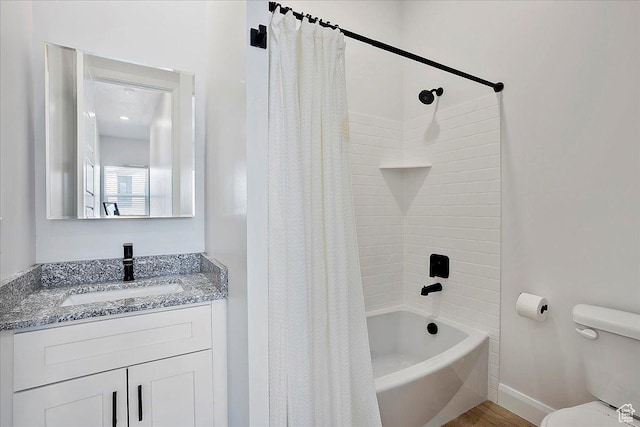 3543 N Creekside Way E Unit 63, Eden, UT 84310 - full bathroom featuring shower / tub combo, baseboards, vanity, and toilet