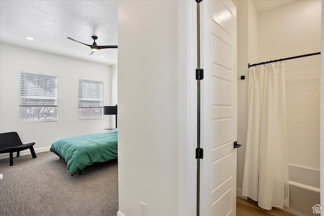 3543 N Creekside Way E Unit 63, Eden, UT 84310 - bedroom with a textured ceiling, ceiling fan, carpet, and baseboards