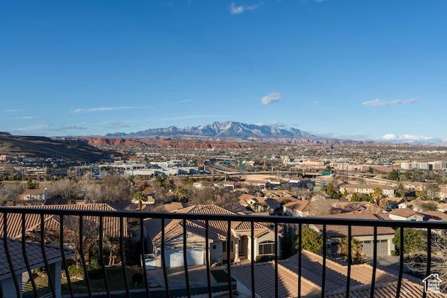 balcony with a residential view and a mountain view