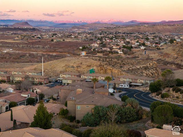 aerial view at dusk with a residential view and a mountain view