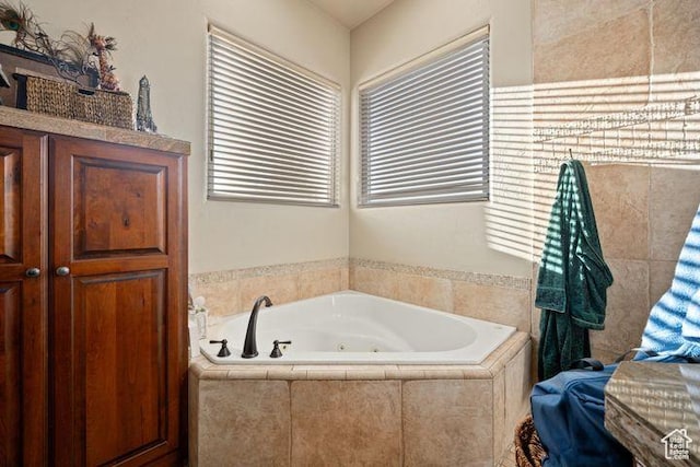 bathroom featuring a jetted tub