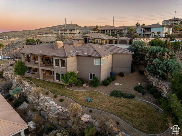birds eye view of property with a residential view