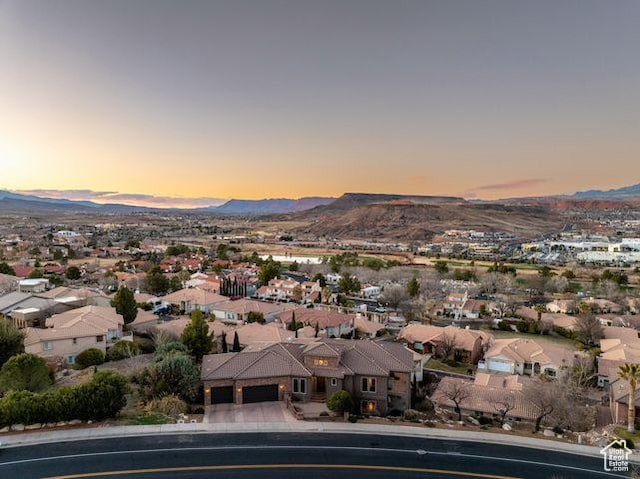 aerial view featuring a residential view and a mountain view