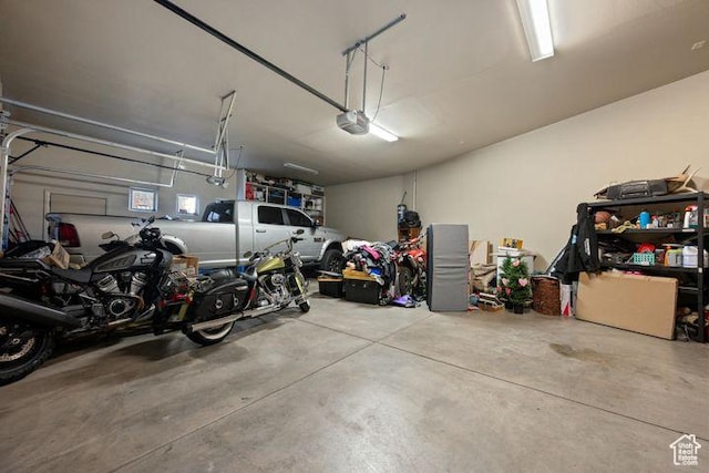 garage featuring a garage door opener