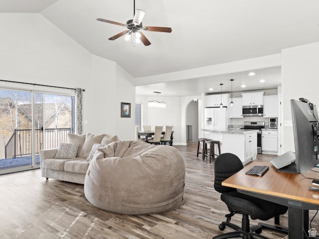 4863 N Shady Hollow Ln W, Lehi, UT 84043 - living room featuring high vaulted ceiling, arched walkways, a ceiling fan, recessed lighting, and wood finished floors