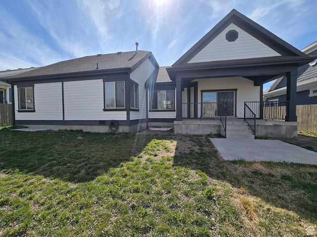 4863 N Shady Hollow Ln W, Lehi, UT 84043 - back of property featuring a yard, a patio area, fence, and covered porch