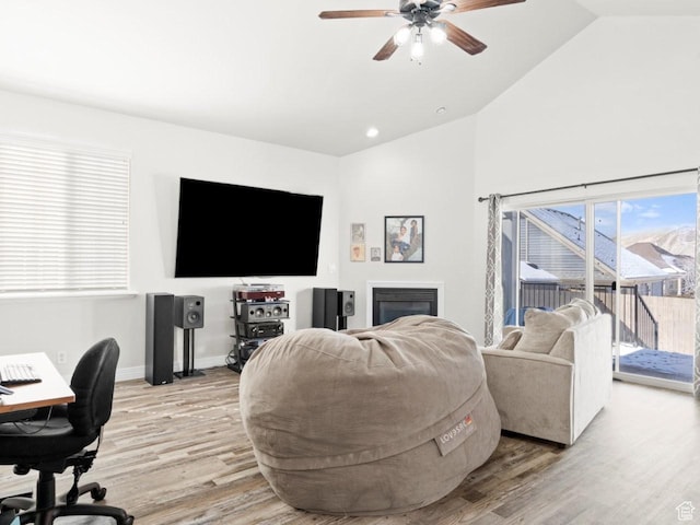 4863 N Shady Hollow Ln W, Lehi, UT 84043 - living area featuring ceiling fan, baseboards, light wood-style floors, and lofted ceiling