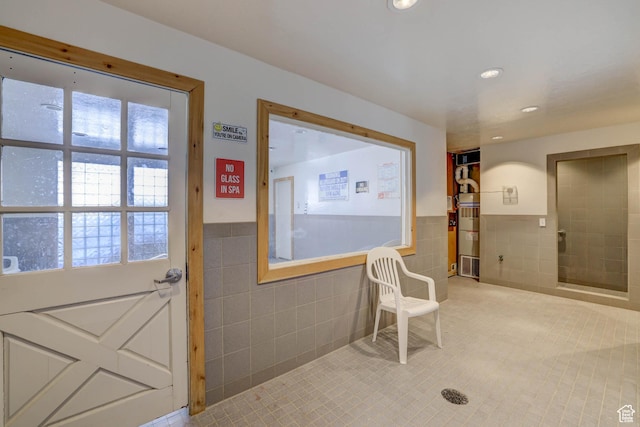 356 S S Hwy Unit A-1, Brian Head, UT 84719 - interior space with recessed lighting, tile patterned flooring, wainscoting, and tile walls