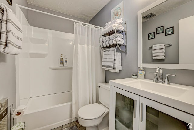 356 S S Hwy Unit A-1, Brian Head, UT 84719 - bathroom featuring toilet, shower / tub combo, vanity, and visible vents