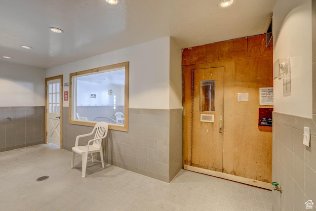 356 S S Hwy Unit A-1, Brian Head, UT 84719 - hallway featuring recessed lighting, a wainscoted wall, and tile walls