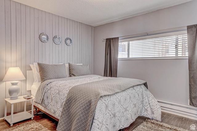356 S S Hwy Unit A-1, Brian Head, UT 84719 - bedroom featuring a textured ceiling and wood finished floors