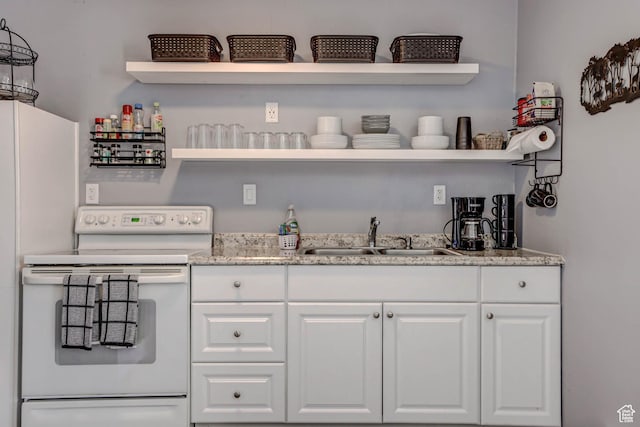 356 S S Hwy Unit A-1, Brian Head, UT 84719 - bar with freestanding refrigerator, white electric range, and a sink