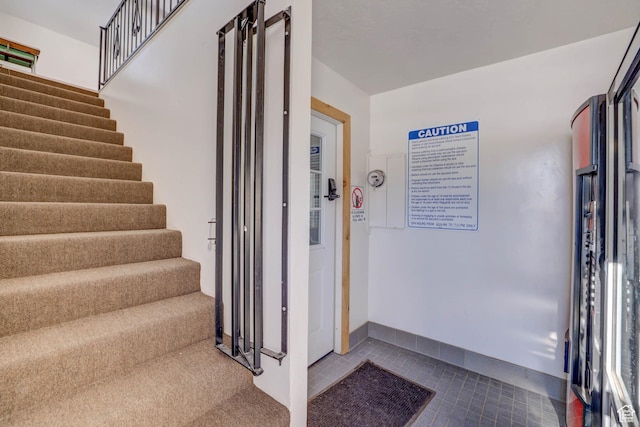 356 S S Hwy Unit A-1, Brian Head, UT 84719 - stairs featuring tile patterned flooring and baseboards