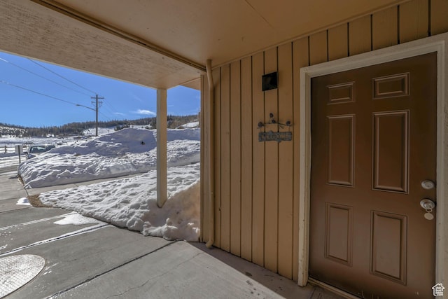356 S S Hwy Unit A-1, Brian Head, UT 84719 - snow covered property entrance featuring board and batten siding