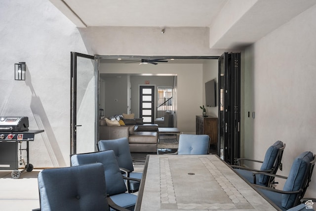 office space with ceiling fan