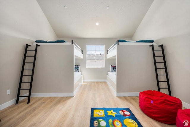 interior space featuring light wood-style floors and baseboards