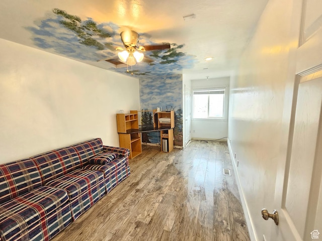 245 W 300 N, Fillmore, UT 84631 - living area with ceiling fan, wood finished floors, and baseboards