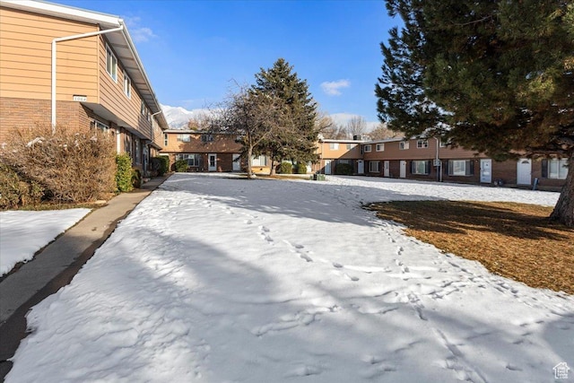 exterior space with a residential view and driveway