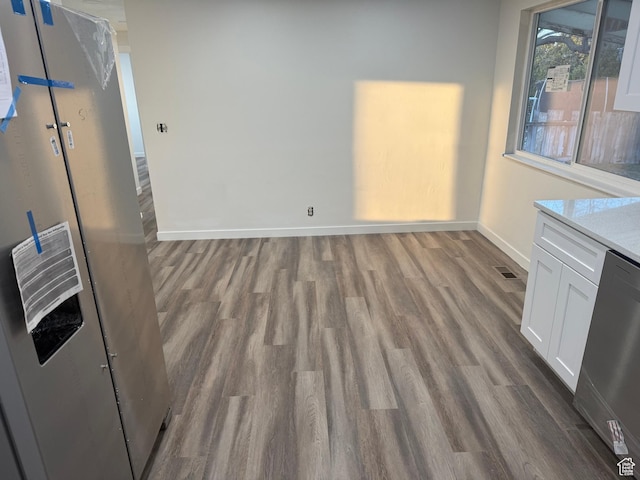 4129 S 3600 W, West Valley City, UT 84119 - interior space with visible vents, baseboards, and wood finished floors