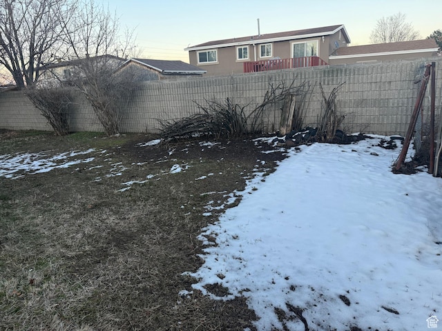 4129 S 3600 W, West Valley City, UT 84119 - snowy yard featuring a fenced backyard
