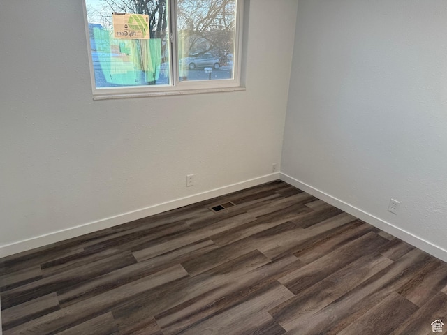 4129 S 3600 W, West Valley City, UT 84119 - unfurnished room with dark wood-type flooring and baseboards