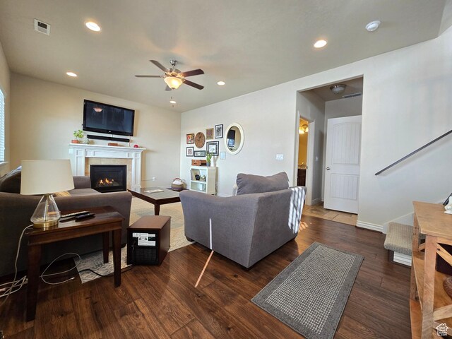 935 W 2100 N, Pleasant View, UT 84404 - living room featuring a ceiling fan, dark wood-type flooring, a lit fireplace, recessed lighting, and baseboards