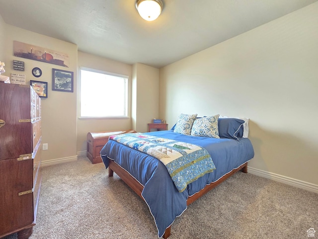 935 W 2100 N, Pleasant View, UT 84404 - bedroom featuring baseboards and carpet