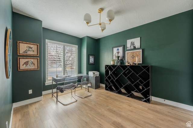 1863 S 900 E, Lehi, UT 84043 - interior space with a chandelier, light wood-style flooring, a textured ceiling, and baseboards
