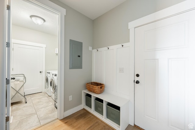 1863 S 900 E, Lehi, UT 84043 - mudroom with light wood-type flooring, electric panel, baseboards, and washer and clothes dryer