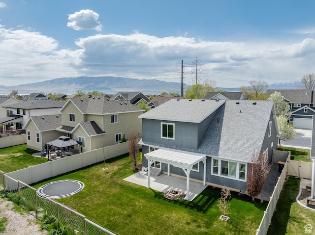 1863 S 900 E, Lehi, UT 84043 - back of house featuring a residential view, roof with shingles, a fenced backyard, and a patio