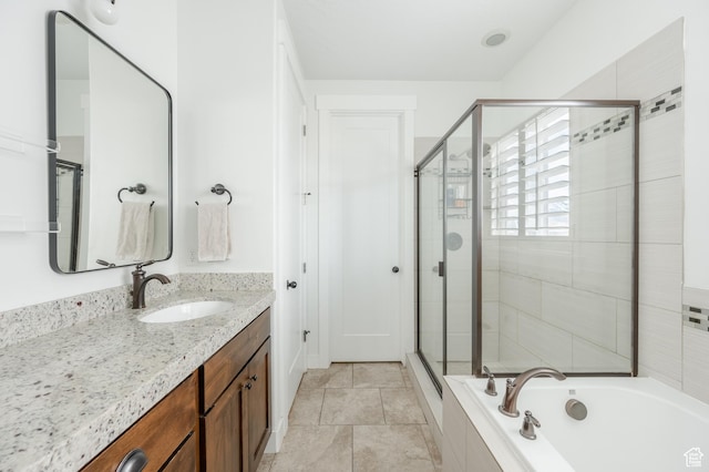 1863 S 900 E, Lehi, UT 84043 - full bathroom with tile patterned floors, vanity, a relaxing tiled tub, and a stall shower