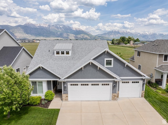 1863 S 900 E, Lehi, UT 84043 - craftsman-style home with a mountain view, stone siding, driveway, and an attached garage