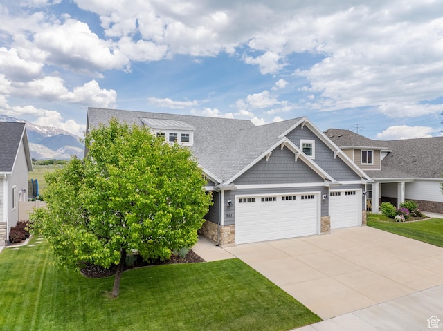 1863 S 900 E, Lehi, UT 84043 - view of front of house with stone siding, concrete driveway, a garage, a front yard, and a shingled roof
