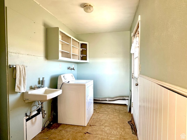 7998 E 5250 S, Randlett, UT 84063 - laundry area with a sink, laundry area, washer / clothes dryer, and a wainscoted wall